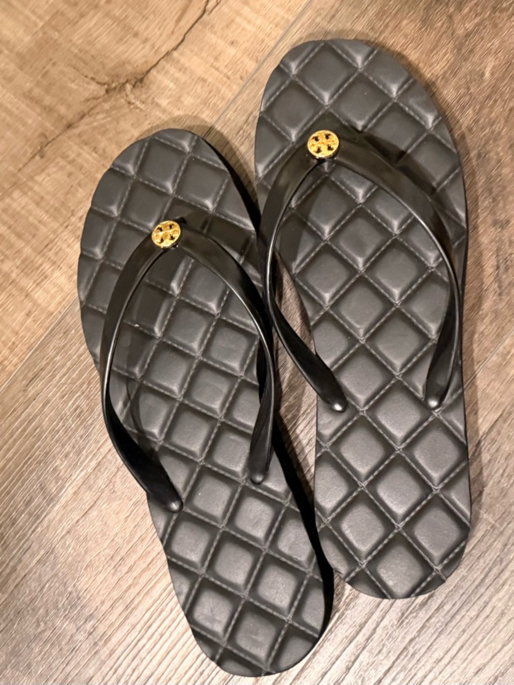 Tory Burch Black Quilted Flip Flop Sandals with Gold Logo Accent